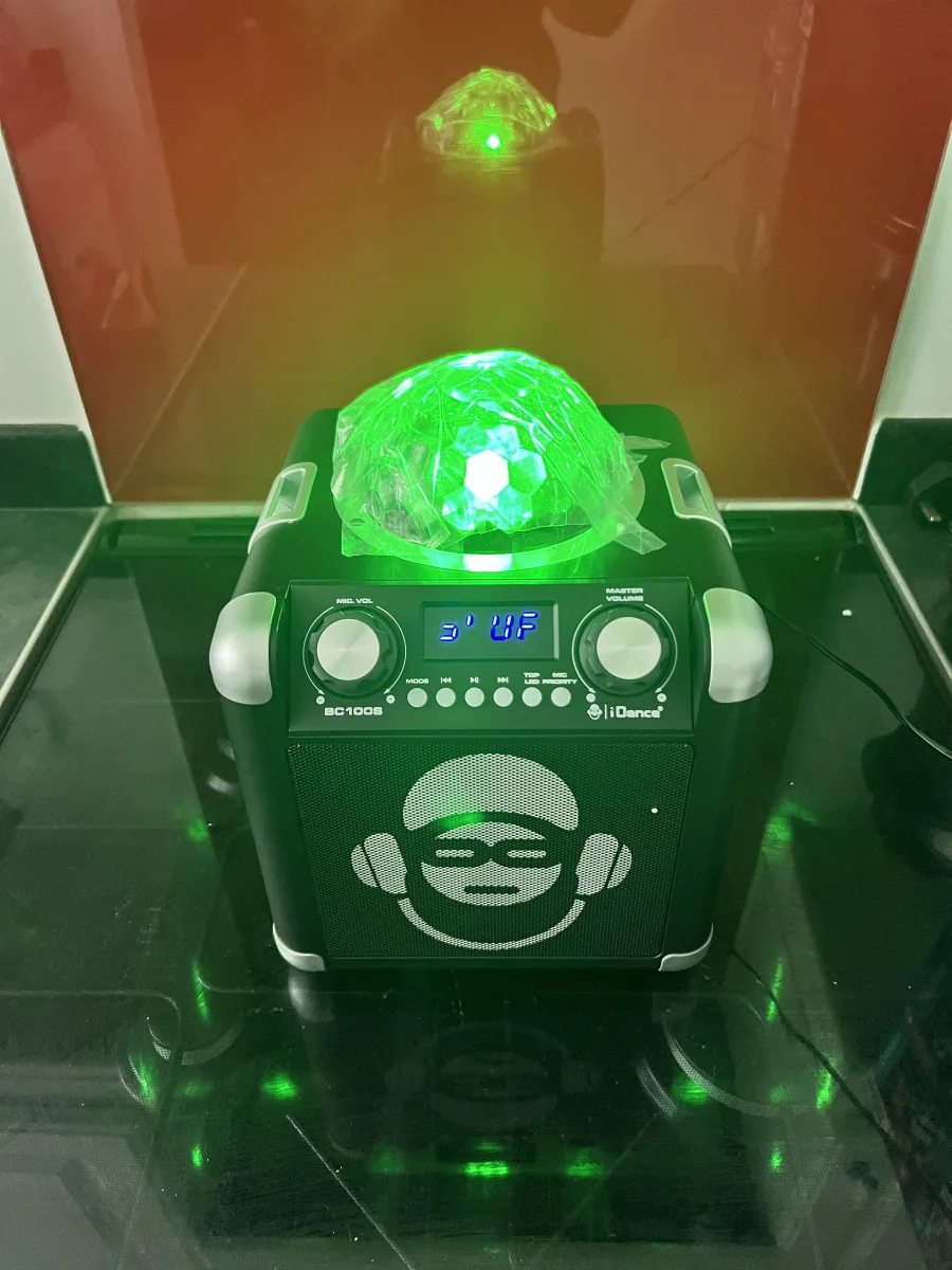 Bluetooth Speaker with Disco Ball Light action shot 3
